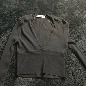 black knit shirt